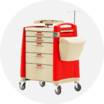 Red and beige medical supply cart with drawers and IV pole. Hospital emergency or crash cart.