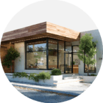 Architecturally designed clinic building with stone and wood finishes, welcoming entryway.