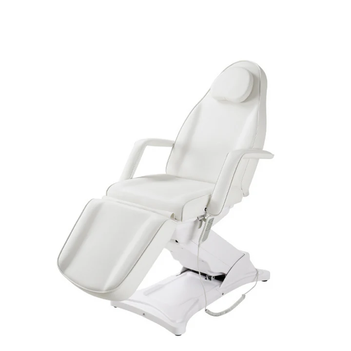 Electric beauty chair in white leather, fully adjustable for medical and spa treatments