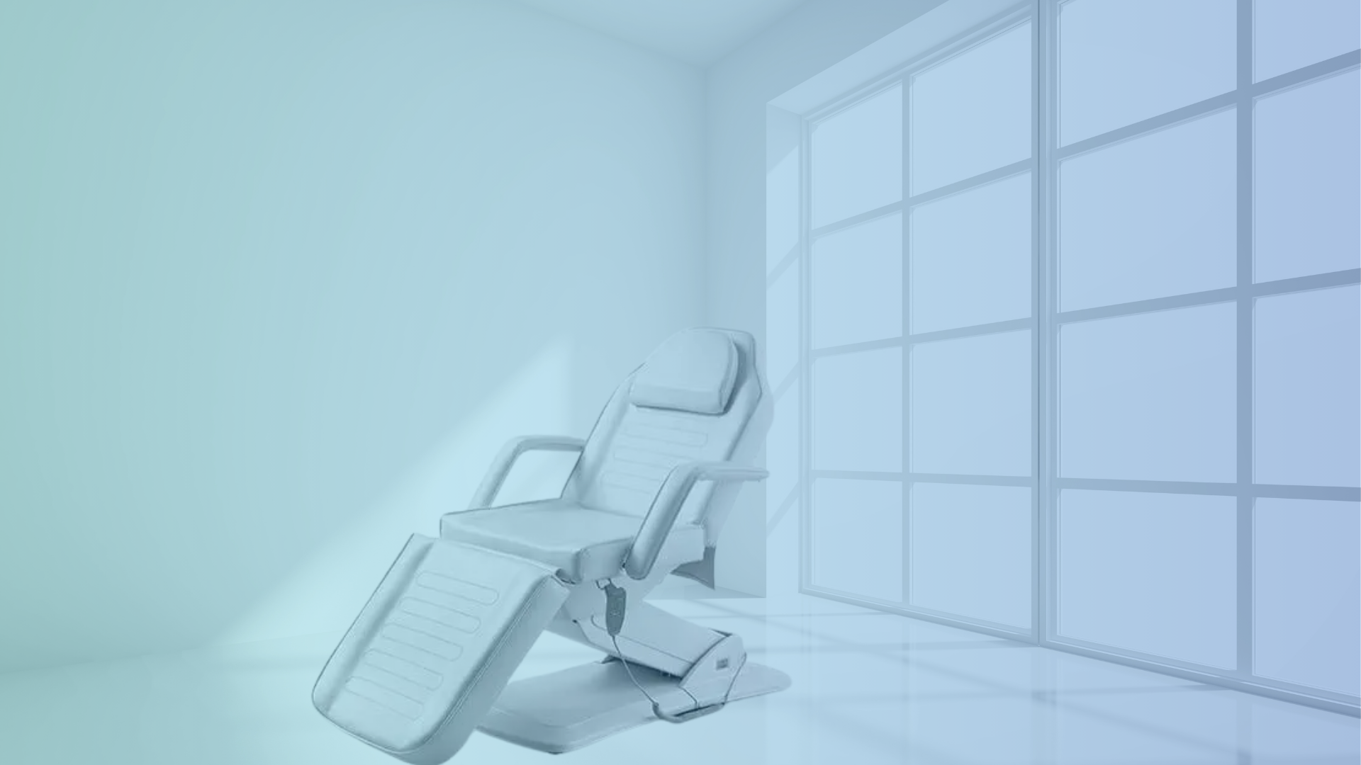 White electric treatment chair in a minimalist, bright clinic room with large window.